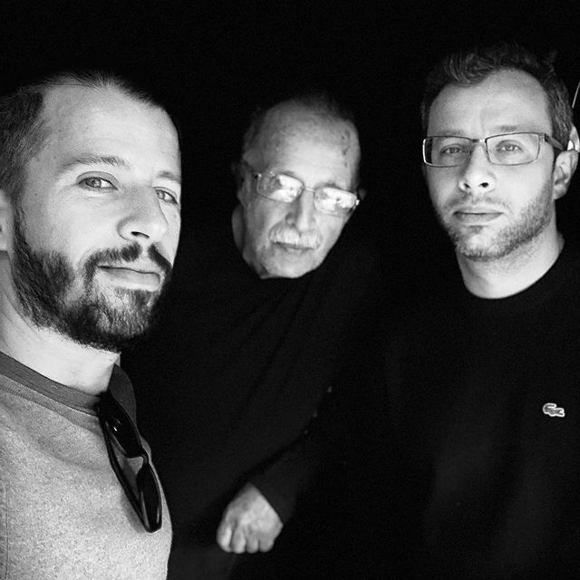 My dad, the gentleman in the middle